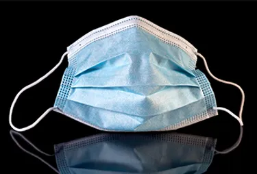 Surgical mask (Photo credit: Moment/Getty Images)
