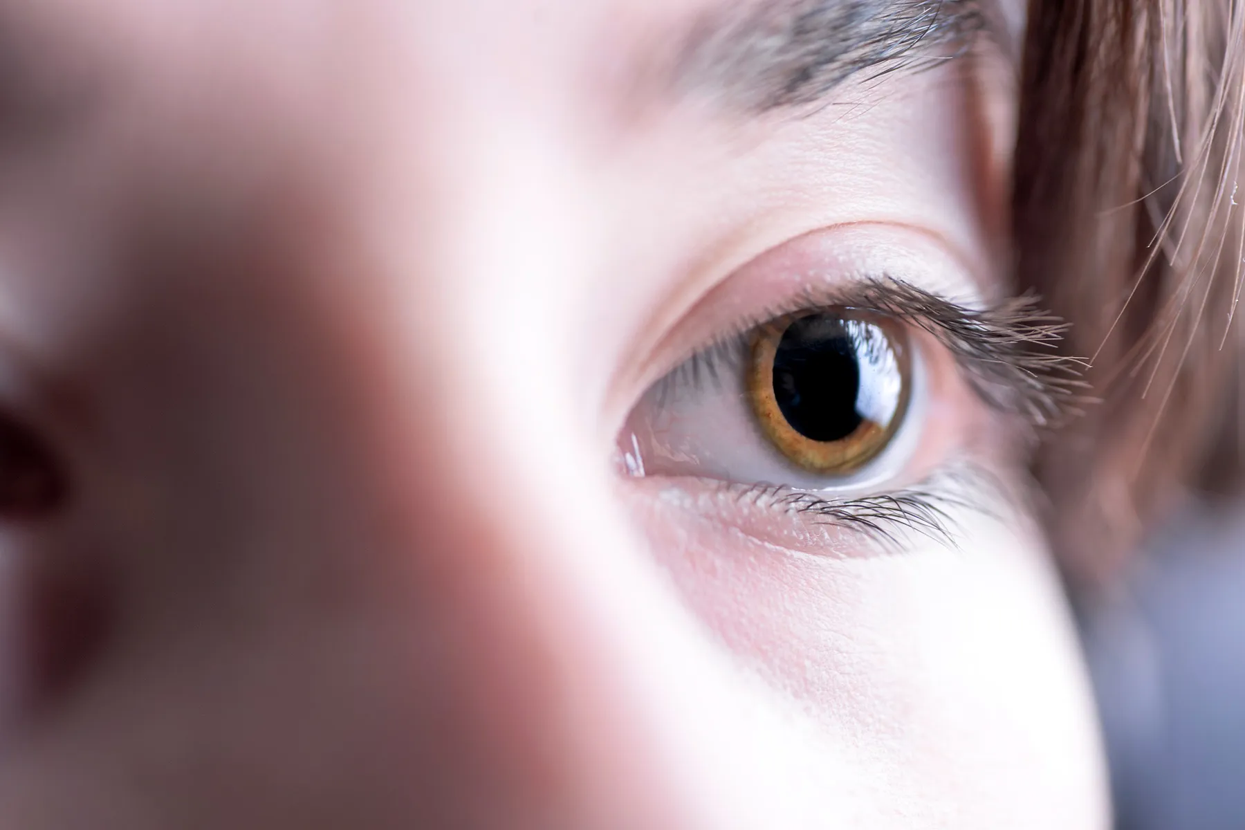 photo of woman's dilated eye close up