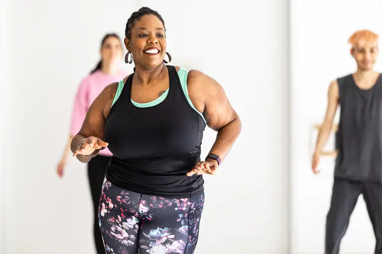 photo of african woman enjoying Zumba
