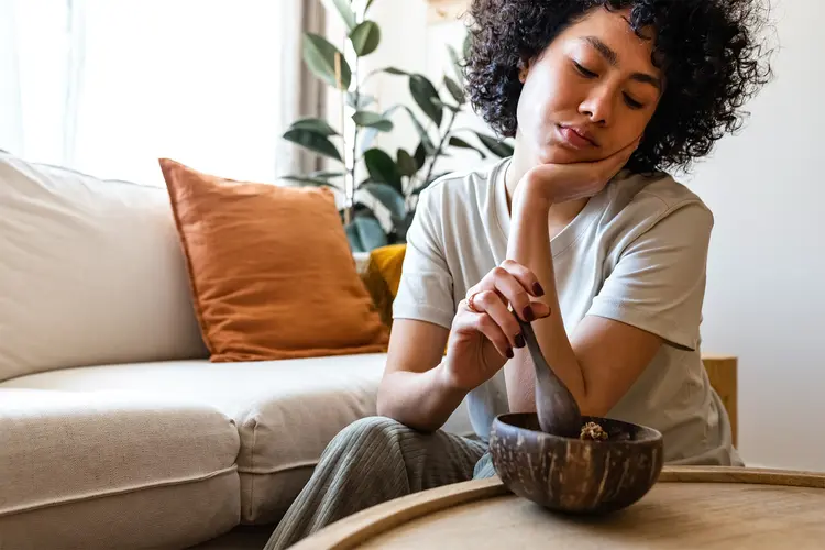 photo of woman eating breakfast