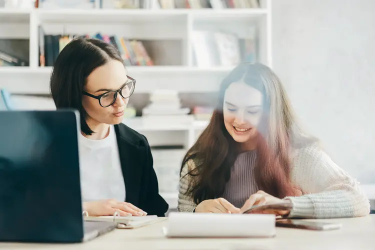 photo of tutor working with student