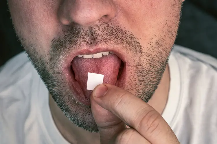photo of man with blotter paper