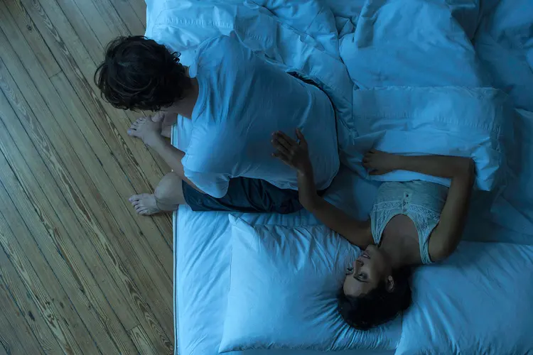 photo of woman reassuring man