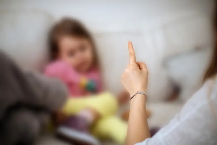 photo of parent disciplining child