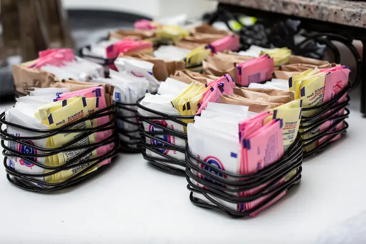 photo of several sugar packets 