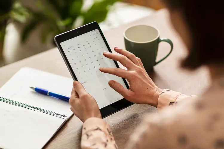 photo of Woman using a tablet