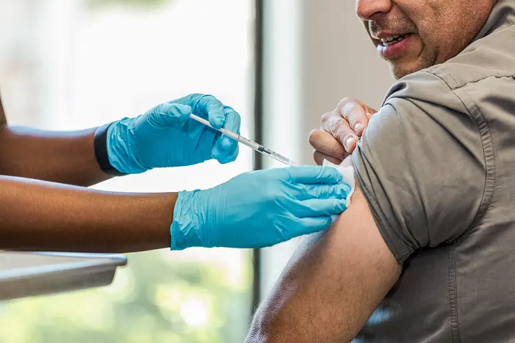 photo of adult getting vaccine dose