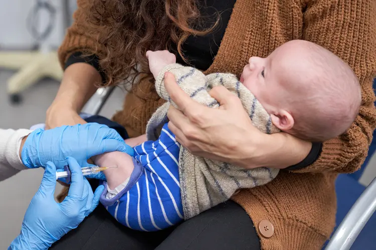 photo of baby getting vaccinated