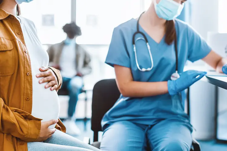 photo of Doctor talking to patient