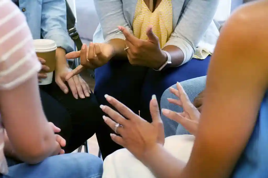 photo of woman in group therapy session