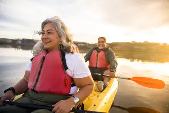 photo of senior couple kayaking
