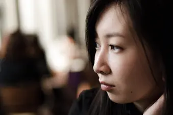 photo of woman waiting in cafe