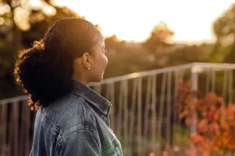 photo of Young woman looking at the view
