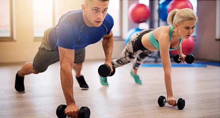 man and woman working out