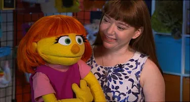 Julia and her puppeteer, Stacey Gordon, who has a son with autism.