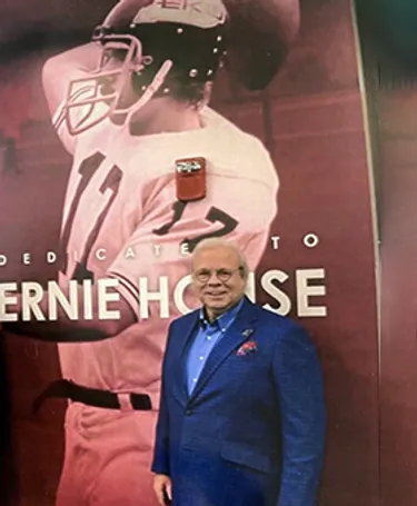 As a young man, Ernest House played quarterback at Eastern Kentucky University.
