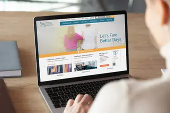 photo of woman doing research on MS website