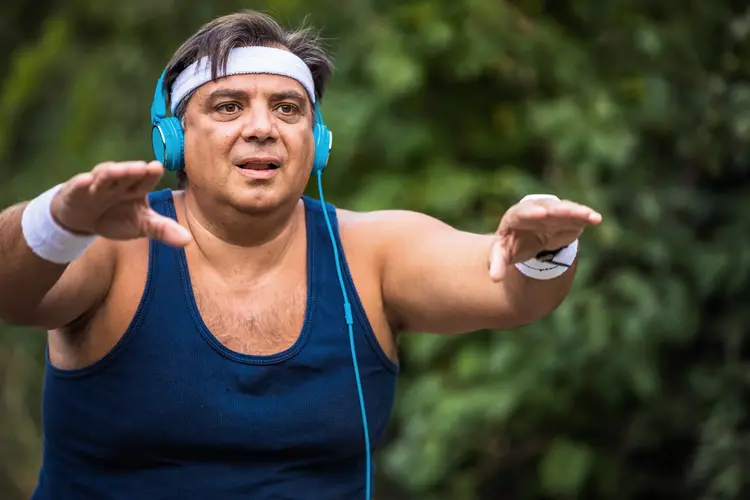 photo of overweight man stretching