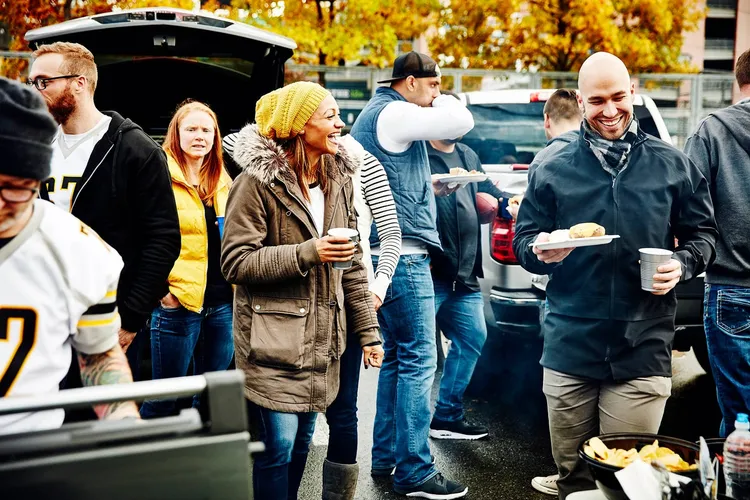 photo of tailgating party in stadium parking lot