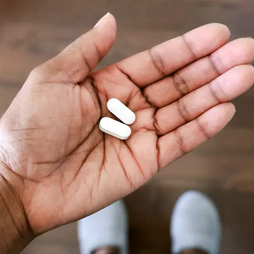 photo of pills in hand