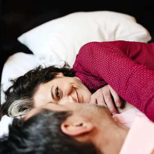 photo of mature couple in bed