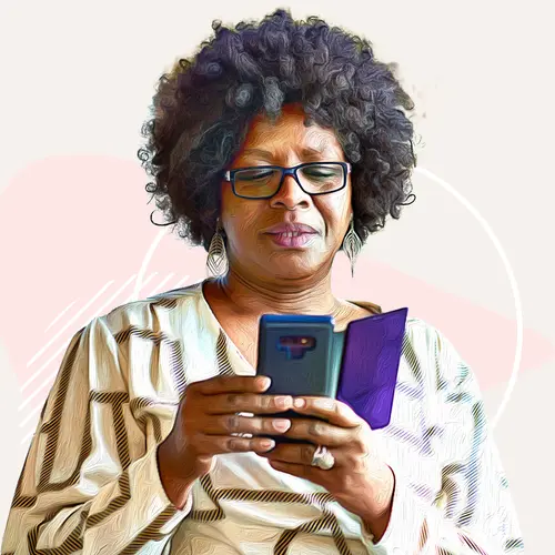 photo of older woman wearing glasses holding phone