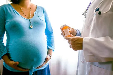 Talk to your doctor about any medications you take while pregnant. (Photo Credit: Adam Hester / Getty Images)