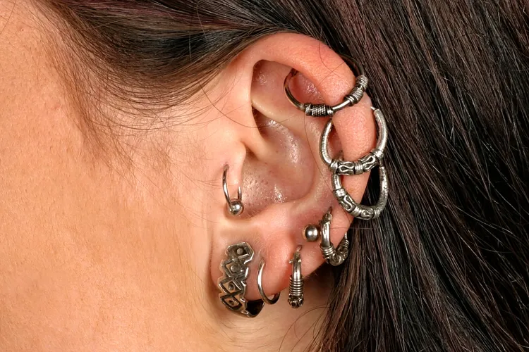 photo of Woman with ear-rings and studs