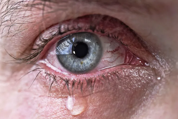 photo of eye of man crying