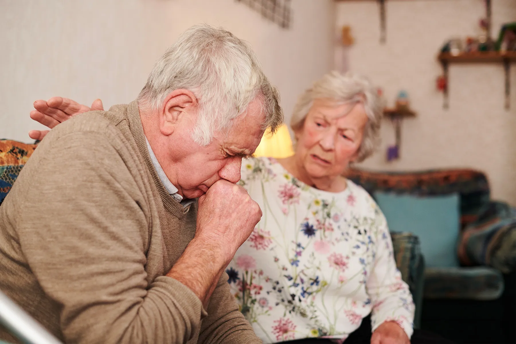 photo of coughing older man