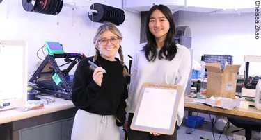 SteadyScrib founders Isabelle Mokotoff (left) and Alexis Chan (right) are Northwestern University undergraduate students who innovated a stabilizing pen system that allows people living with Parkinson’s Disease to write with a steady hand. 