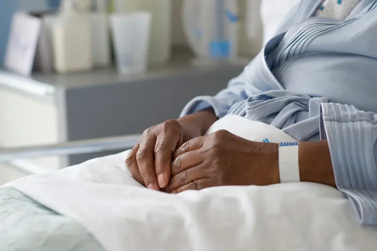 photo of woman in hospital bed