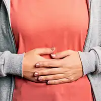photo of woman with upset stomach