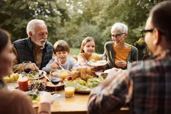 photo of family dinner outside