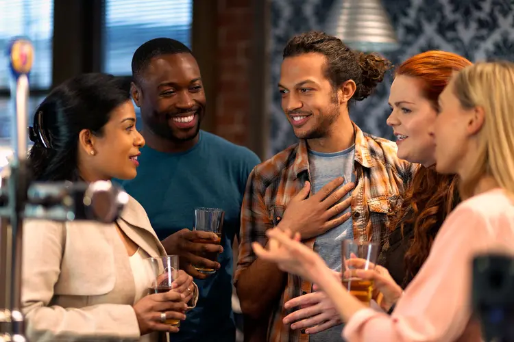 photo of friends drinking together in bar
