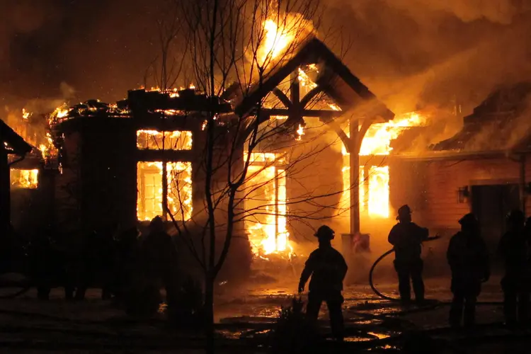 photo of house fire at night