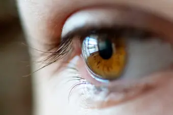 close-up photo of man's eye