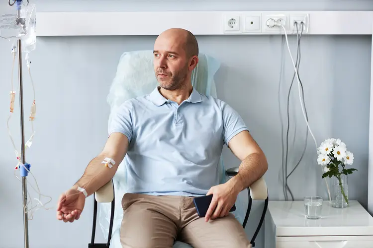 photo of man getting iv drip therapy