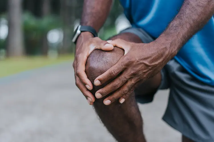 photo of man with knee pain