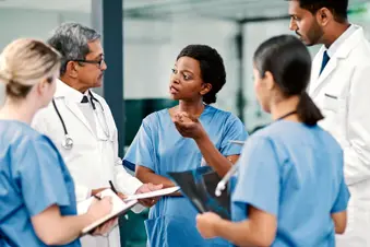 photo of medical team talking in hospital