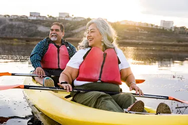 photo of Senior couple kayaking