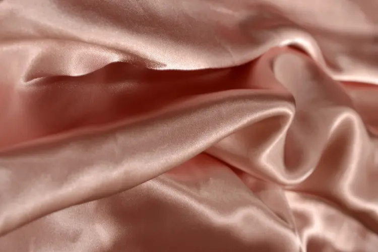 photo of silk sheet on bed