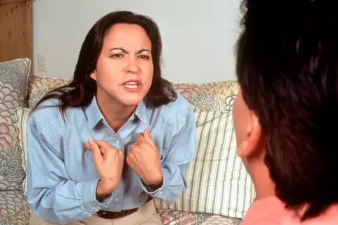 photo of woman arguing with man