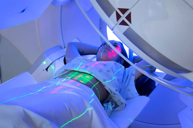 photo of woman receiving radiation therapy treatment for non-small-cell lung cancer