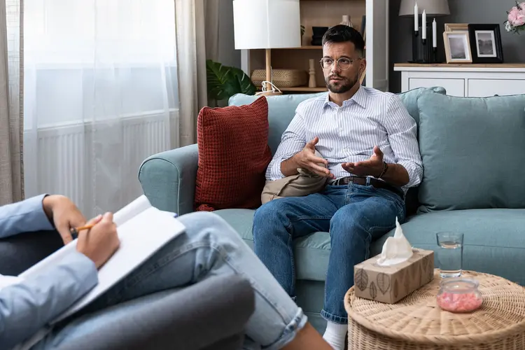 photo of young man in therapy session