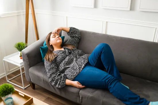photo of woman on couch
