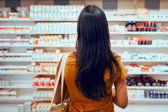 photo of woman shopping in pharmacy