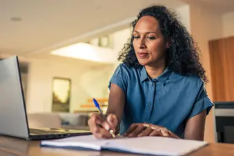 photo of mature woman doing online research