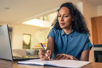 photo of mature woman doing online research