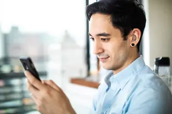 photo of man wearing hearing aid